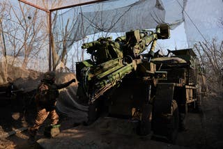 Trained by the French Armed Forces, Ukrainian servicemen of the 155th Brigade of the Armed Forces of Ukraine prepare to launch French-made CAESAR 155mm self-propelled howitzers